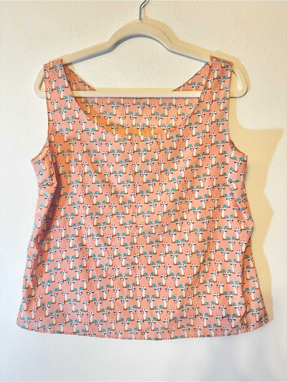 Sleeveless Silky Pink Printed Tank Top with Playful Kitty Cat Motif